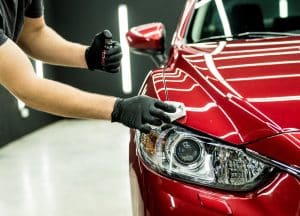 Ceramic Coatings Car Service Worker Applying Nano Coating On A Car.