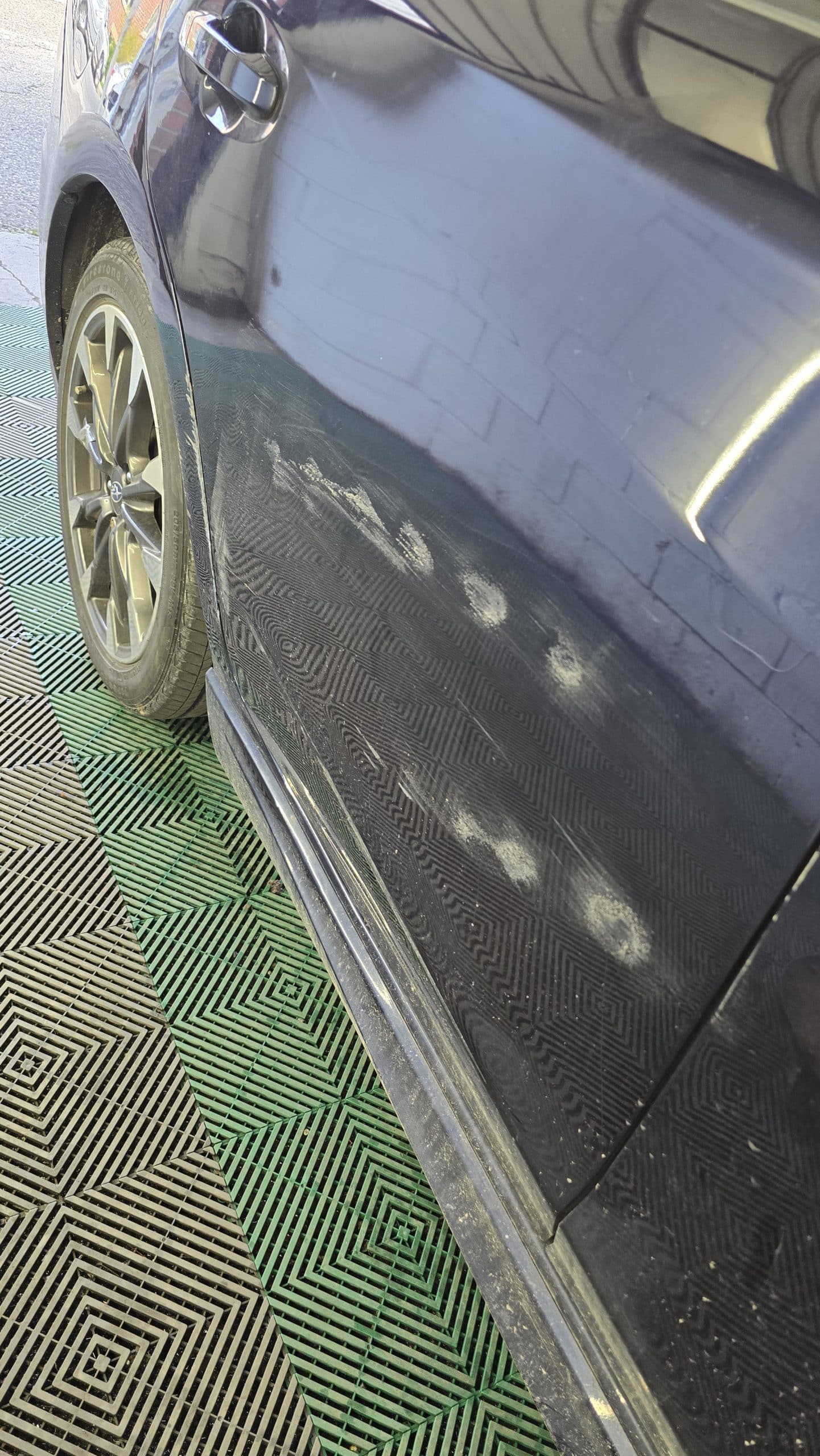 Vehicle paint before paint correction in Toronto showing visible paint defects