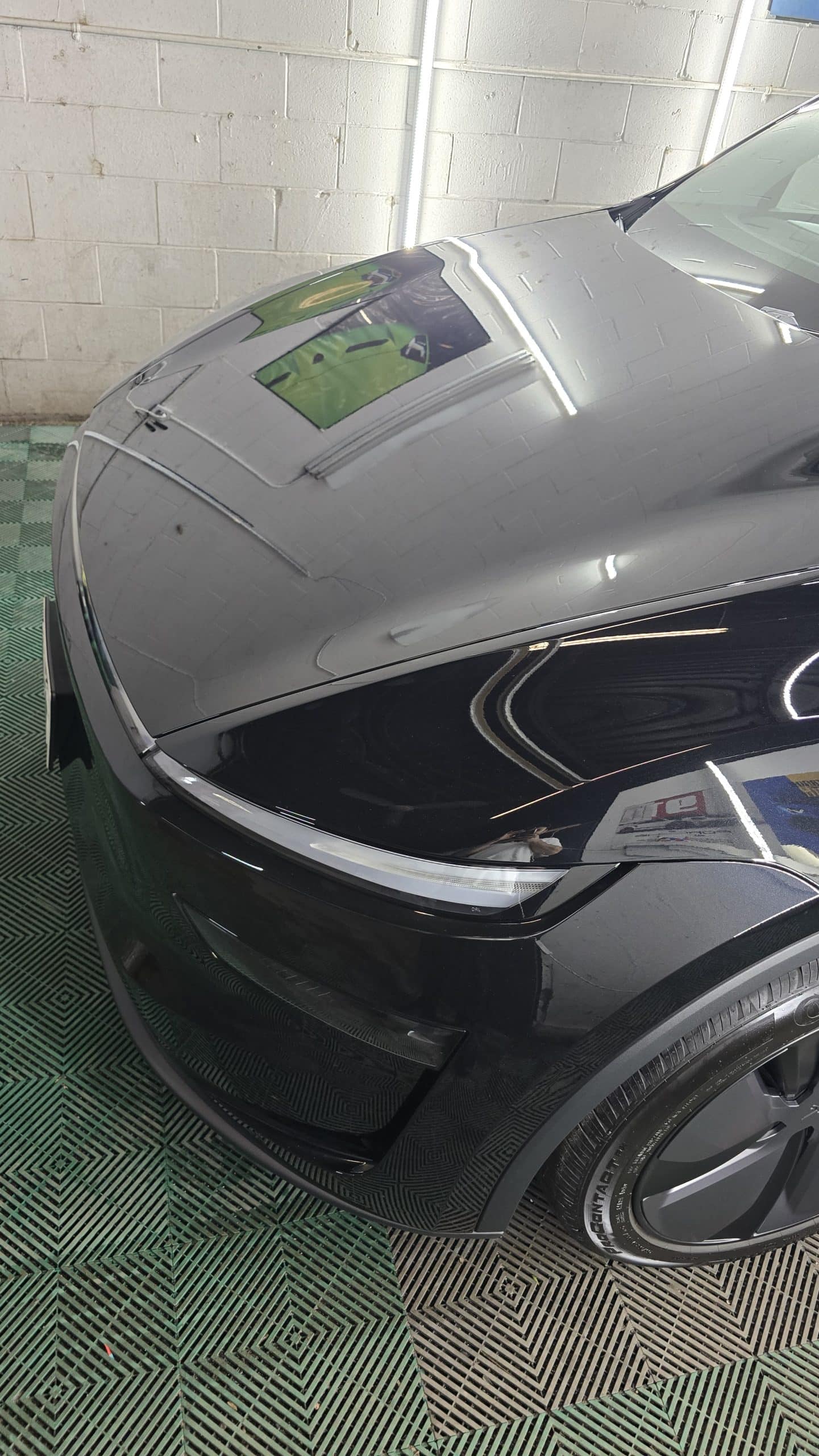 Detailed Tesla exterior after professional ceramic coating in Toronto with a clean glossy finish