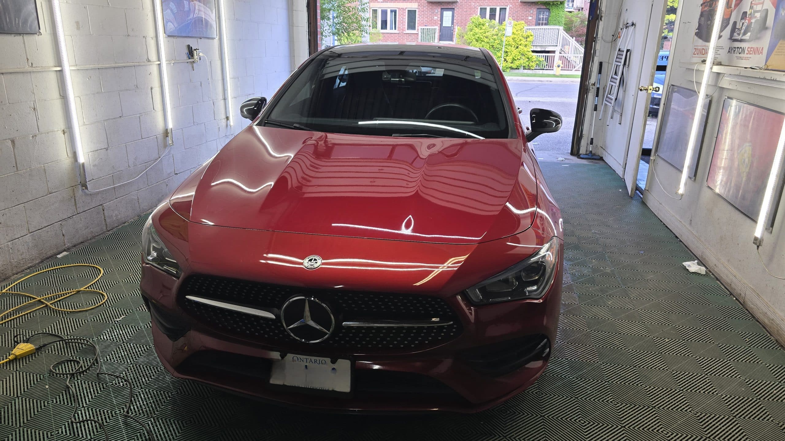 Red Mercedes-Benz receiving professional ceramic coating service at MNV Auto Detailing
